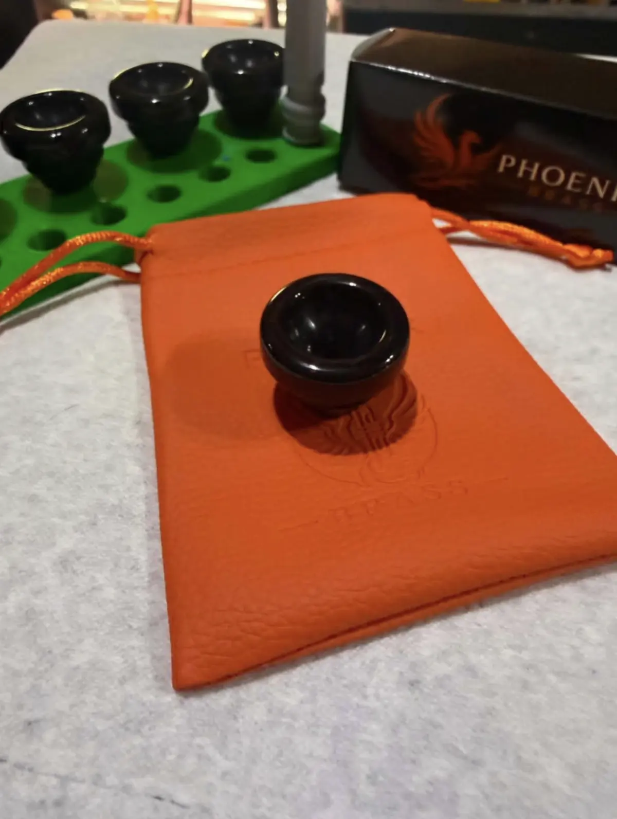 Black Phoenix Brass mouthpiece with a test kit, pouch and presentation box