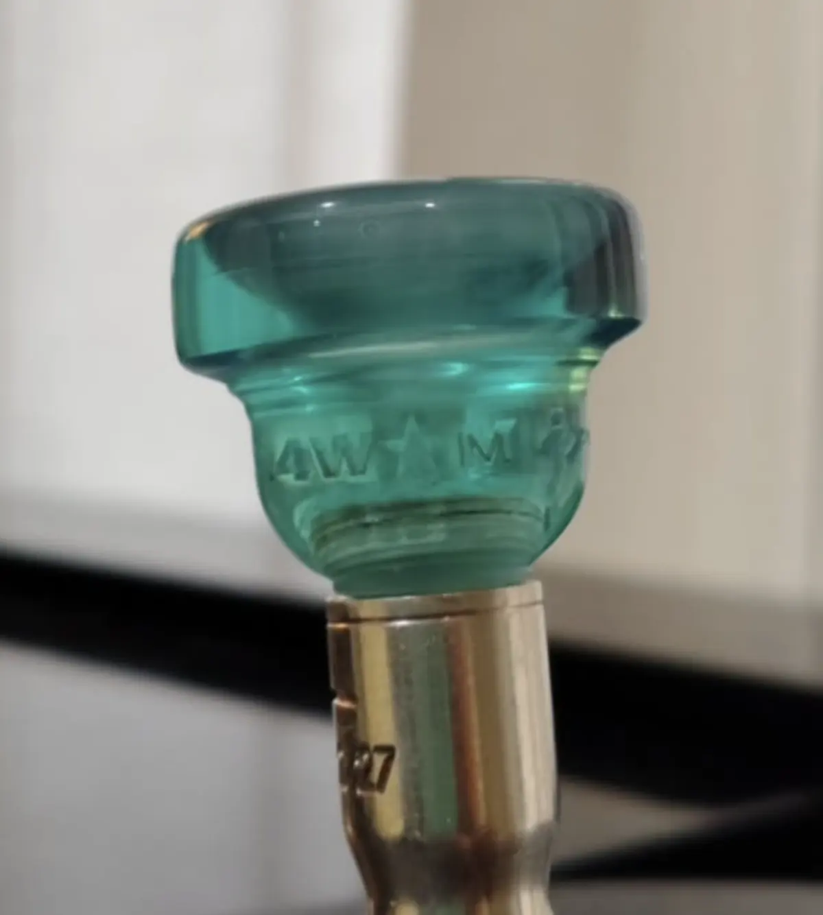 Teal Phoenix Brass mouthpiece top fitted to a brass backbore