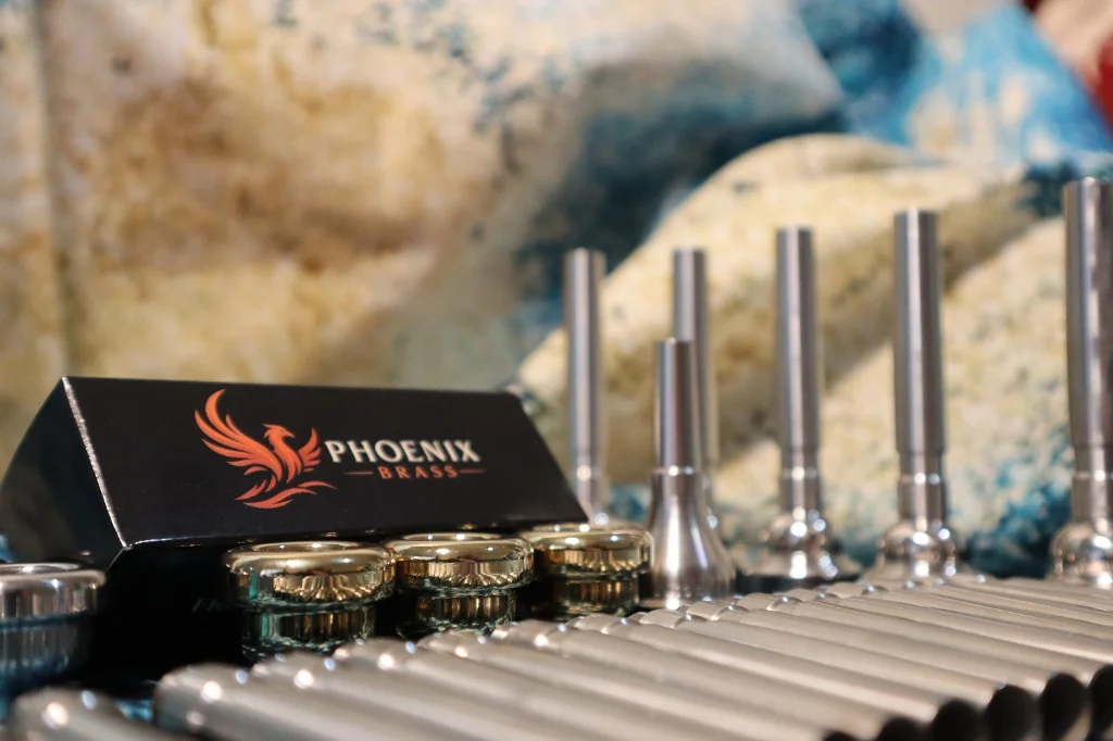 Phoenix Brass stainless steel mouthpieces and backbores beside presentation packaging